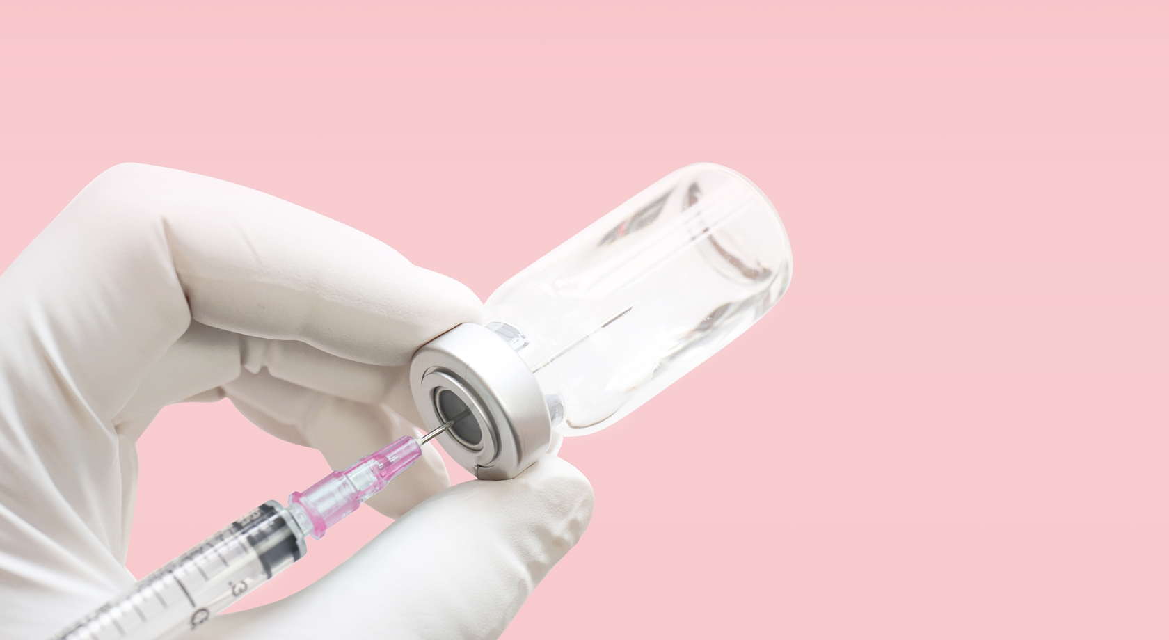 Reference image of a syringe and vial